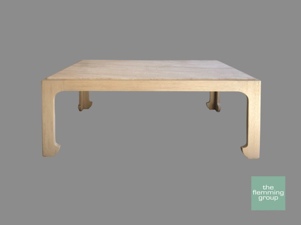 A square coffee table with a wooden base.