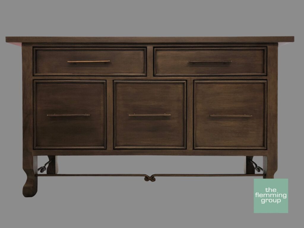 A brown dresser with four drawers and two doors.