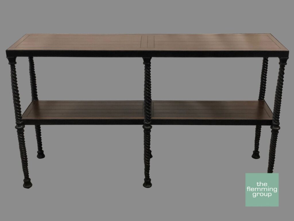 A table with two shelves and black legs.