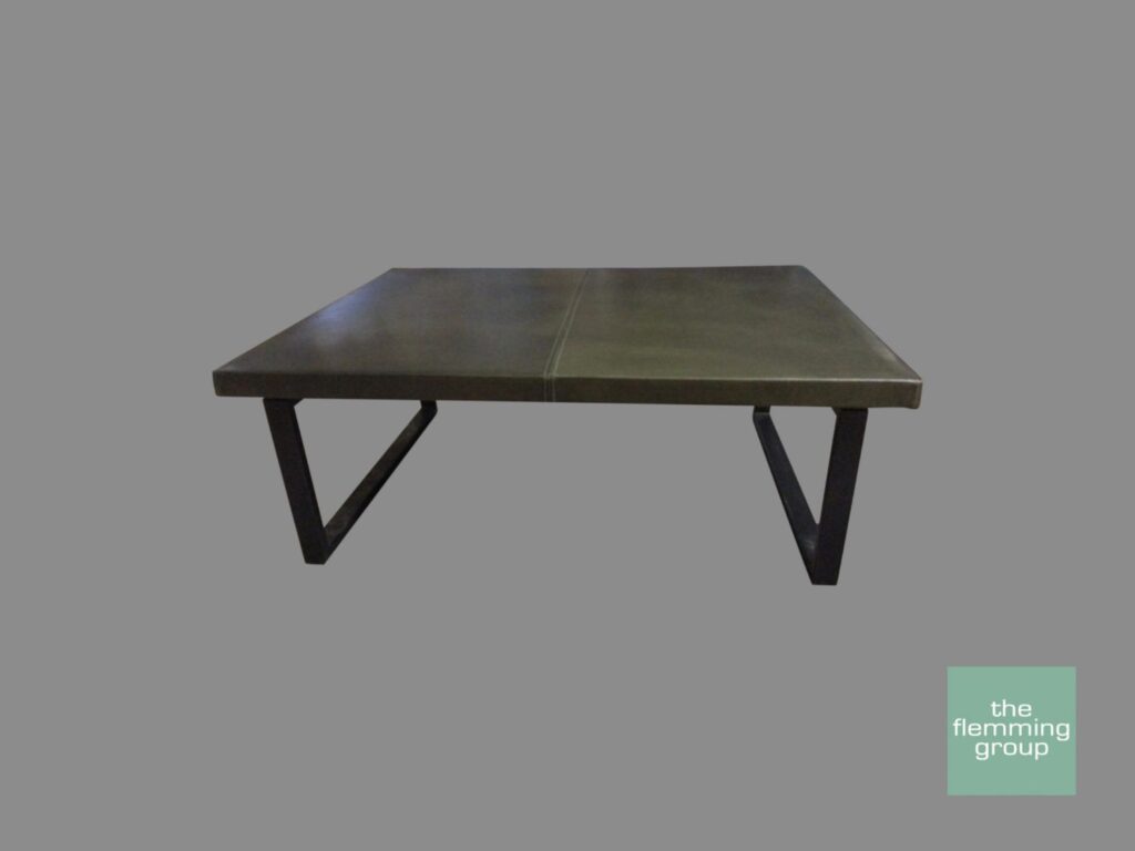 A table with metal legs and wooden top.