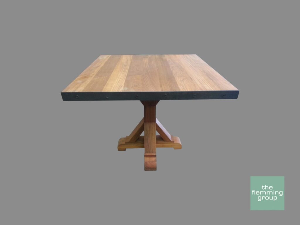 A table with a wooden top and metal base.