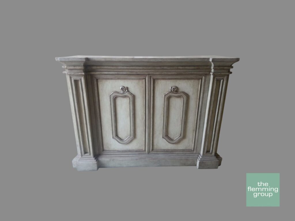 A large white cabinet with two doors and a shelf.