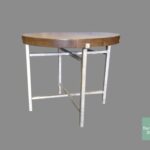 A table with metal legs and wooden top.