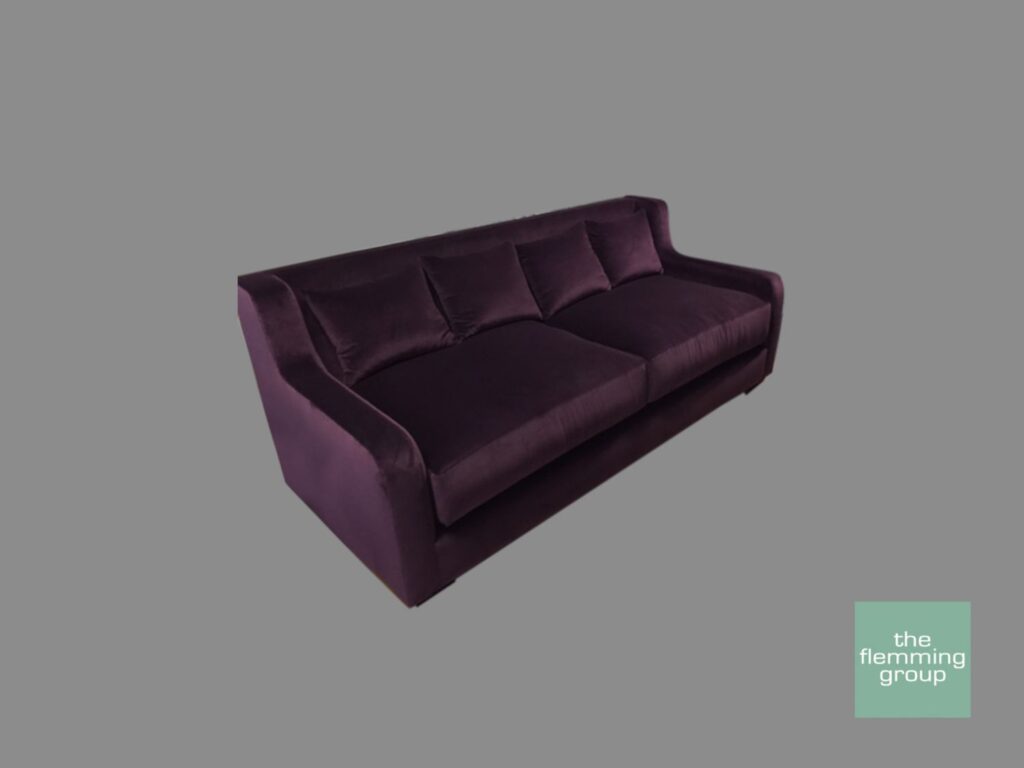 A couch with purple velvet fabric on it.