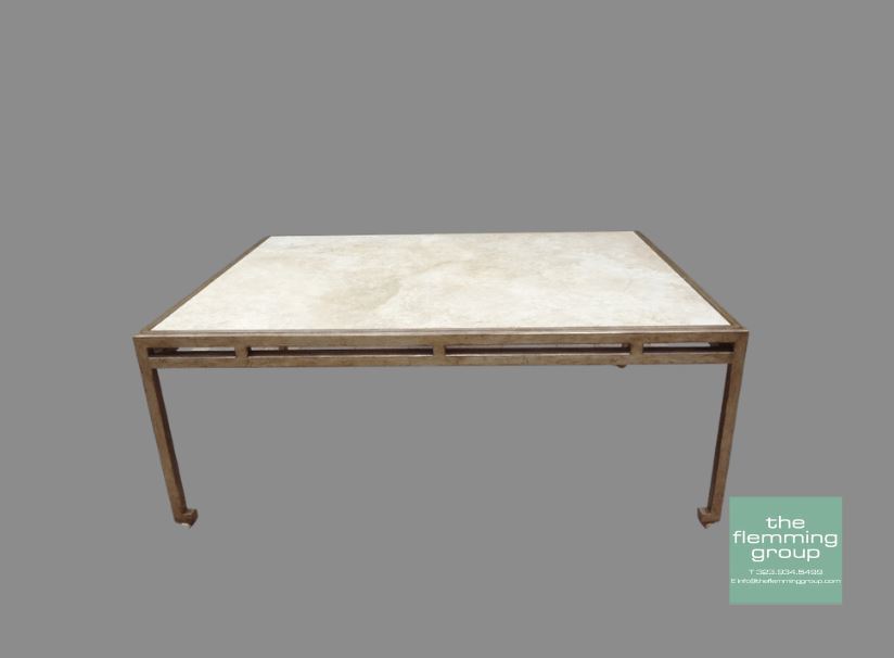 A table with a white marble top and metal frame.