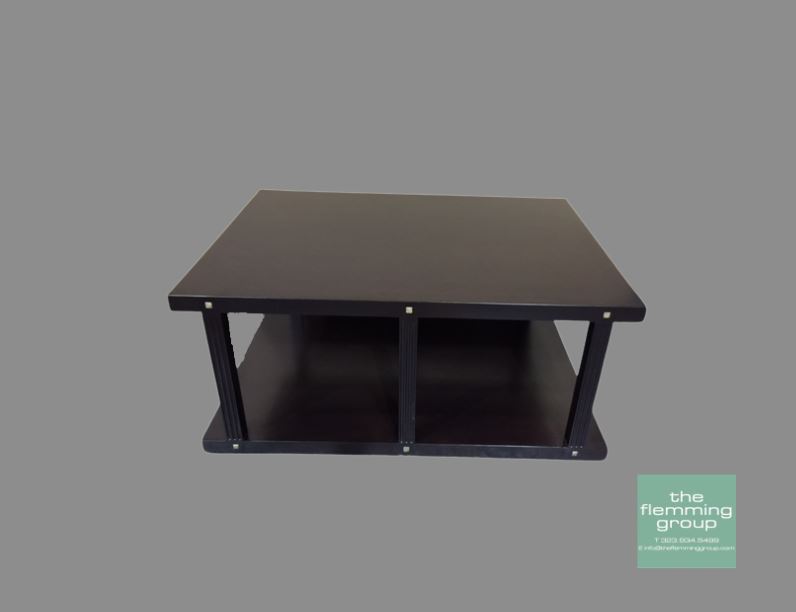 A black table with two shelves on top of it.